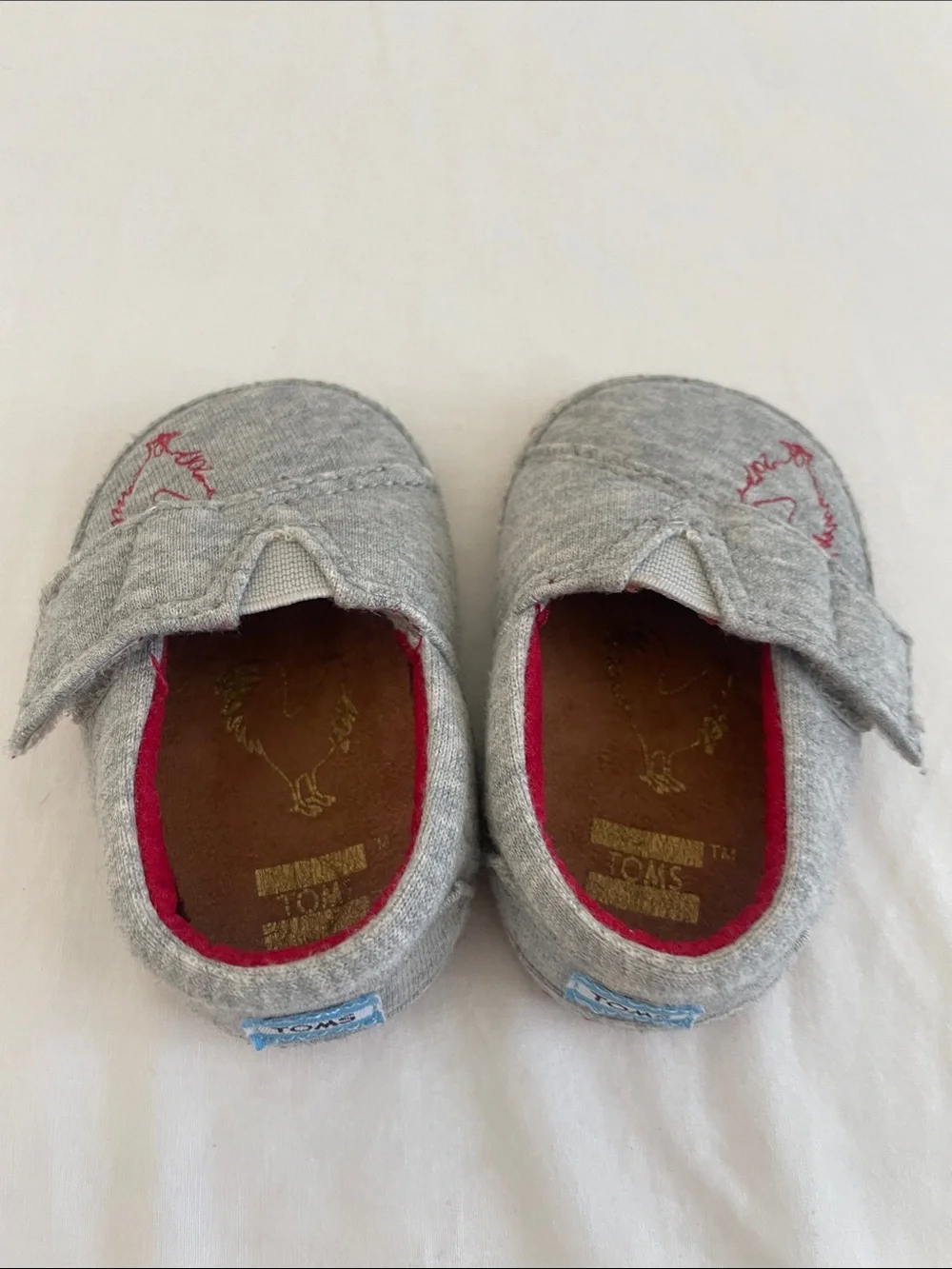 Toms Grey Slip-On Baby Shoes with Red Accents and Rooster Stitch (NWOT) size 2